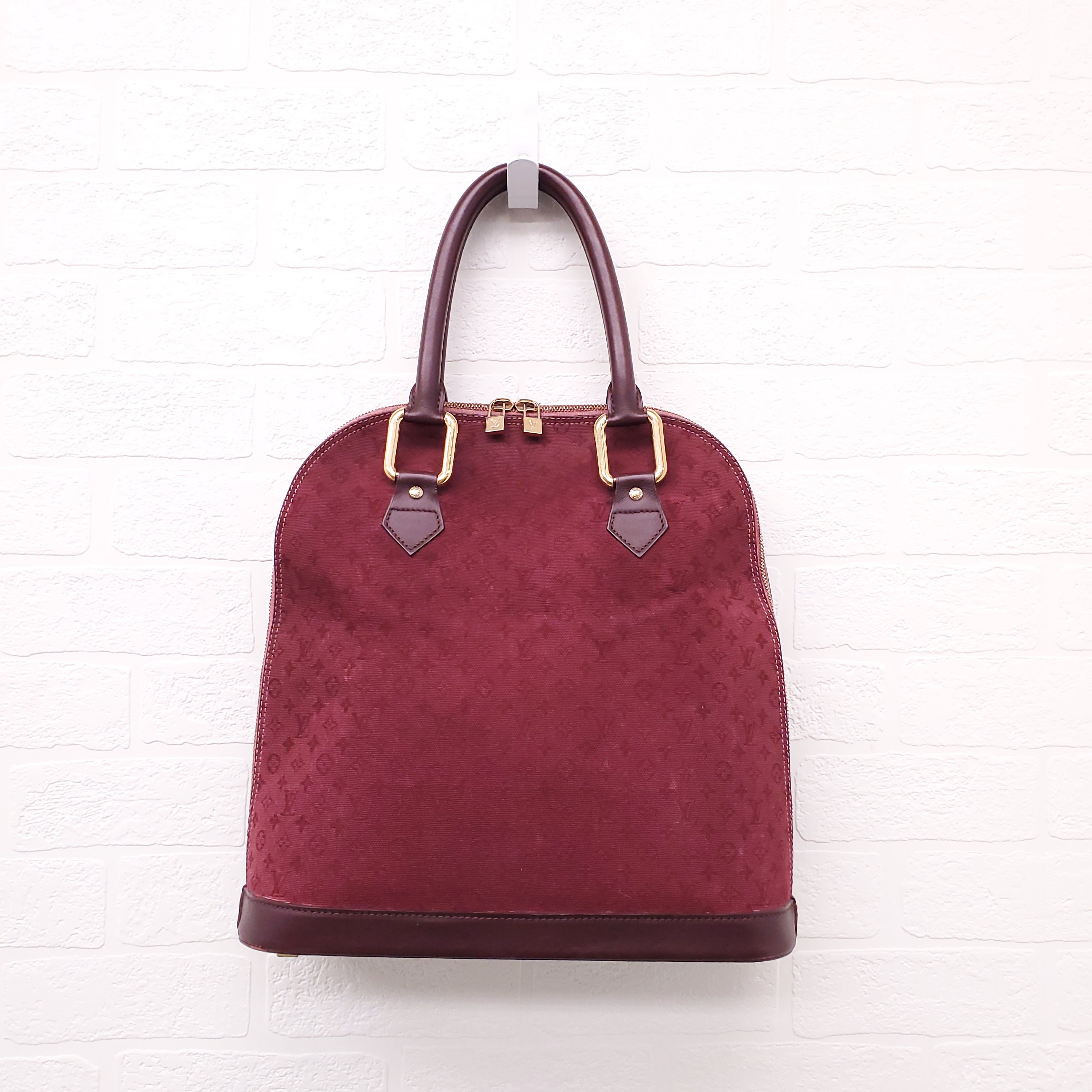 LOUIS VUITTON VINTAGE BURGUNDY MONOGRAM 'ALMA' BAG