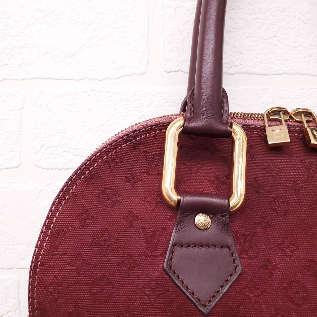 LOUIS VUITTON VINTAGE BURGUNDY MONOGRAM 'ALMA' BAG