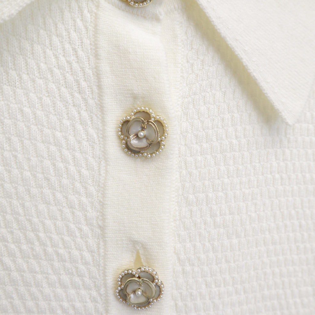 L’AGENCE POLO SHIRT WITH FLORAL BUTTONS - SIZE M
