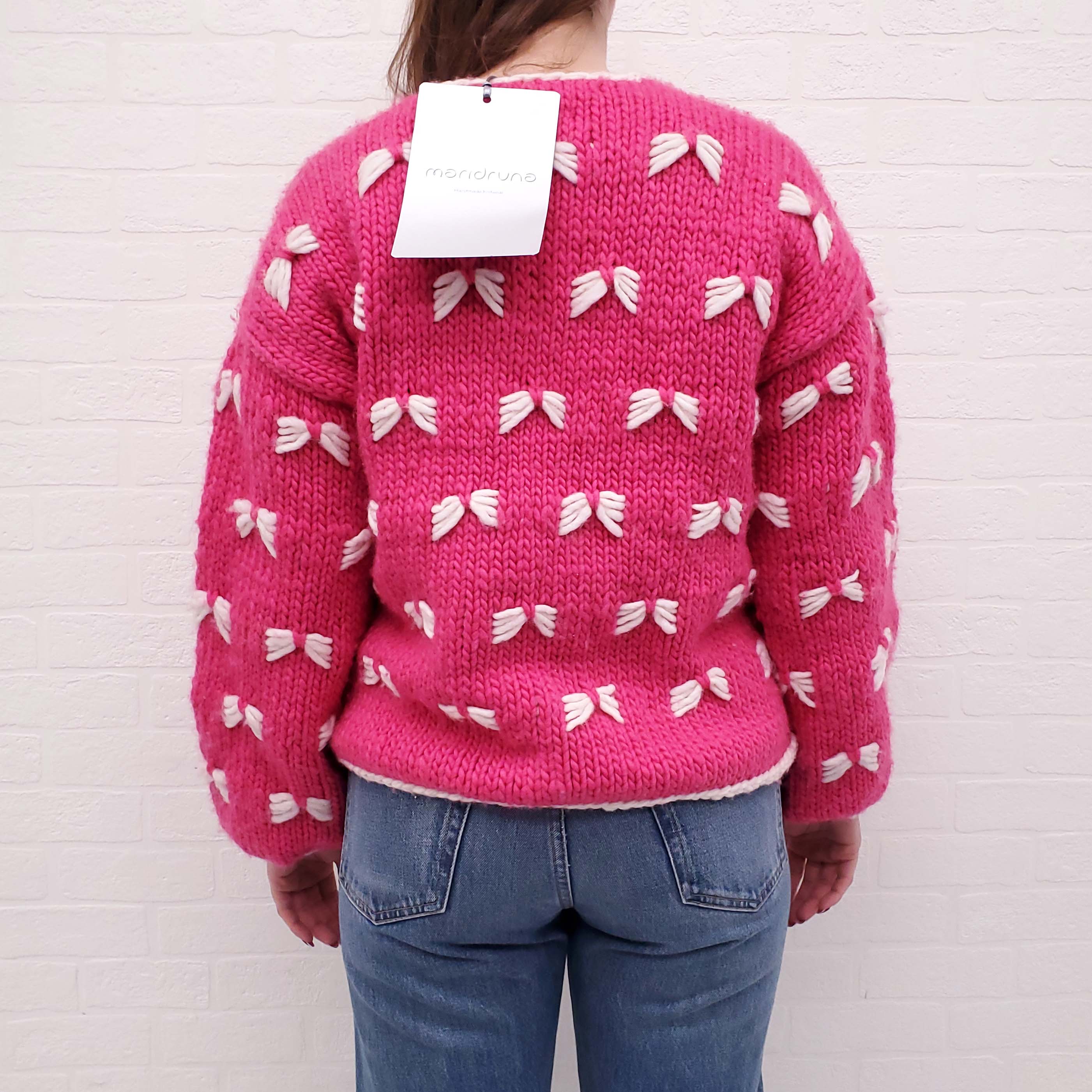 MARIDRUNA PINK BOW SWEATER - SIZE O/S