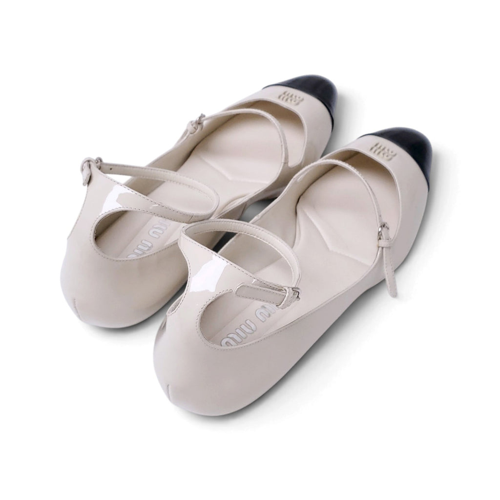 MIU MIU CREAM AND BLACK LOGO MARY-JANE KITTEN HEELS - SIZE 40