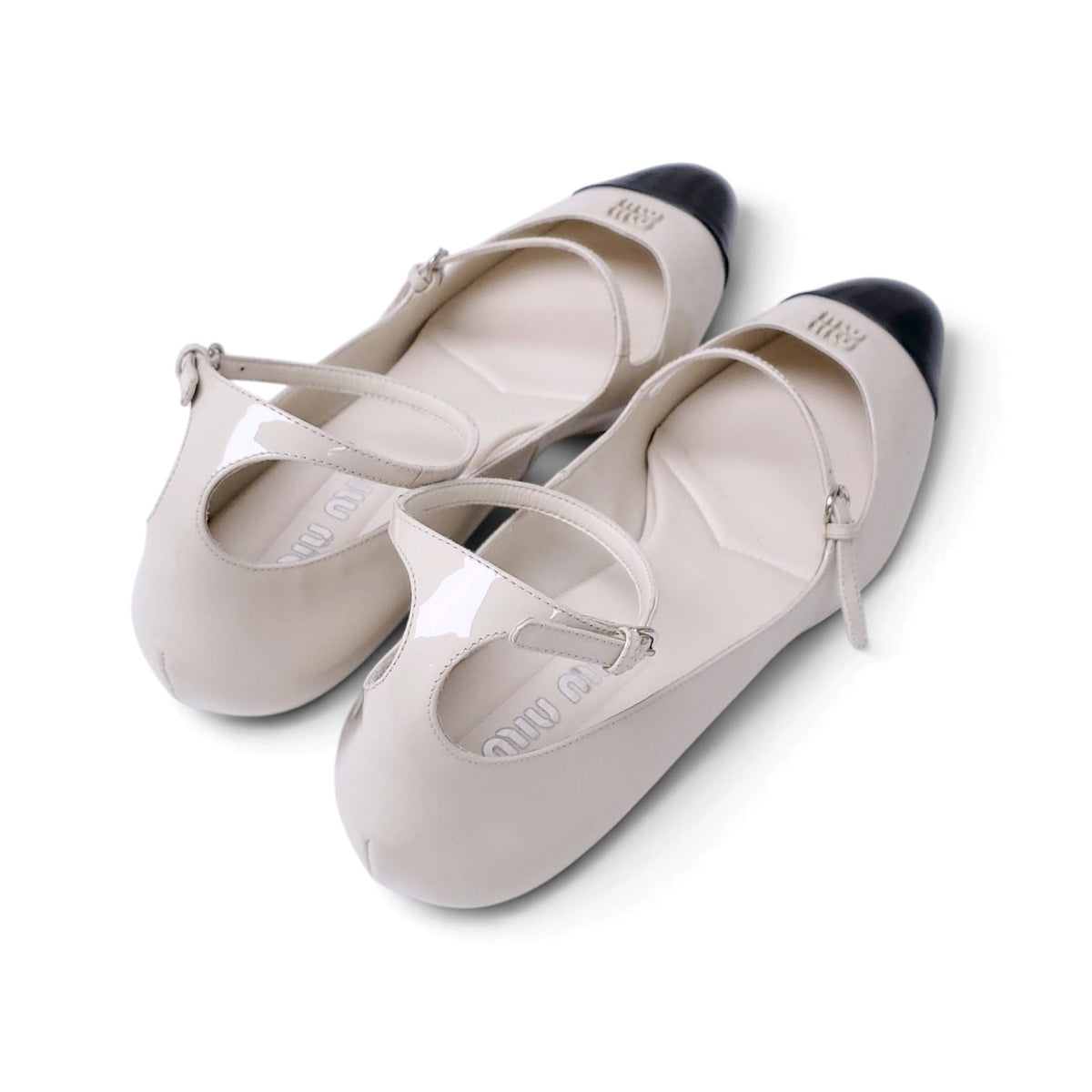 MIU MIU CREAM AND BLACK LOGO MARY-JANE KITTEN HEELS - SIZE 40