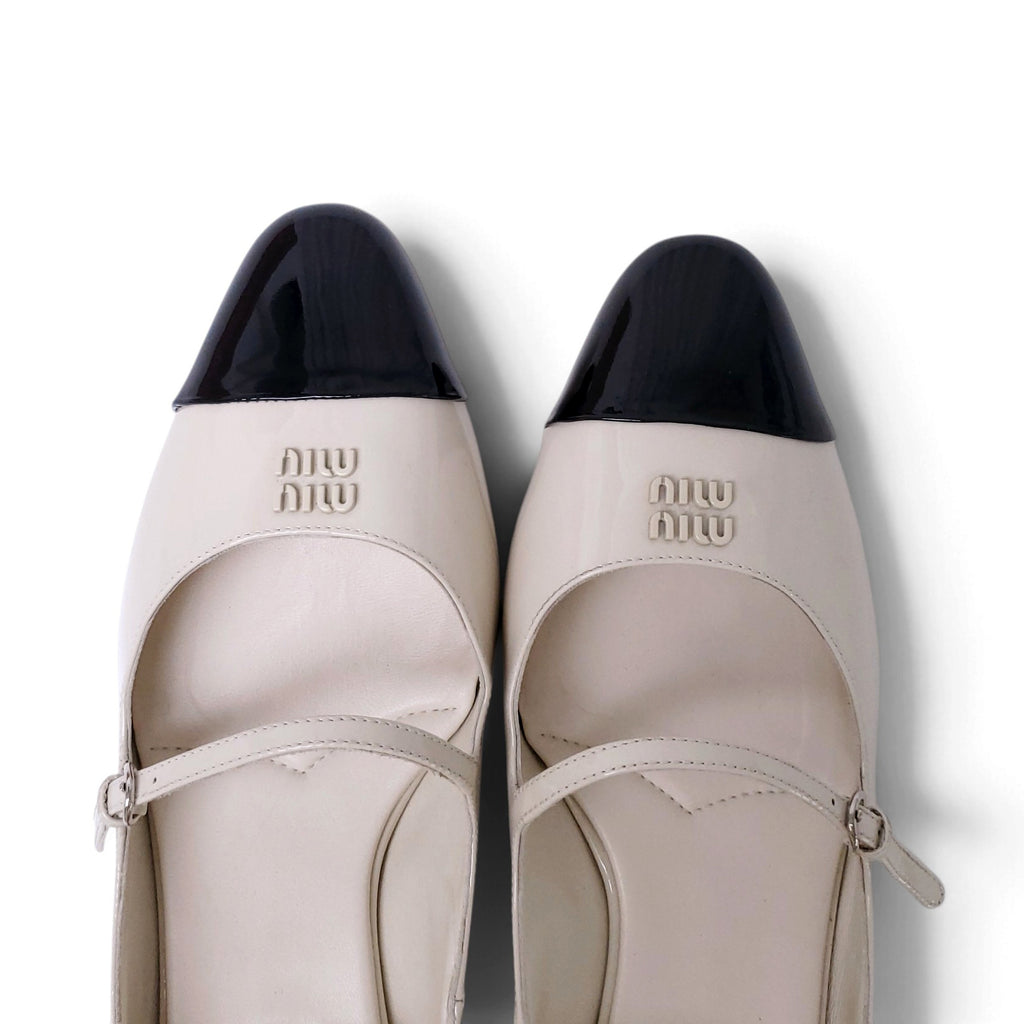 MIU MIU CREAM AND BLACK LOGO MARY-JANE KITTEN HEELS - SIZE 40
