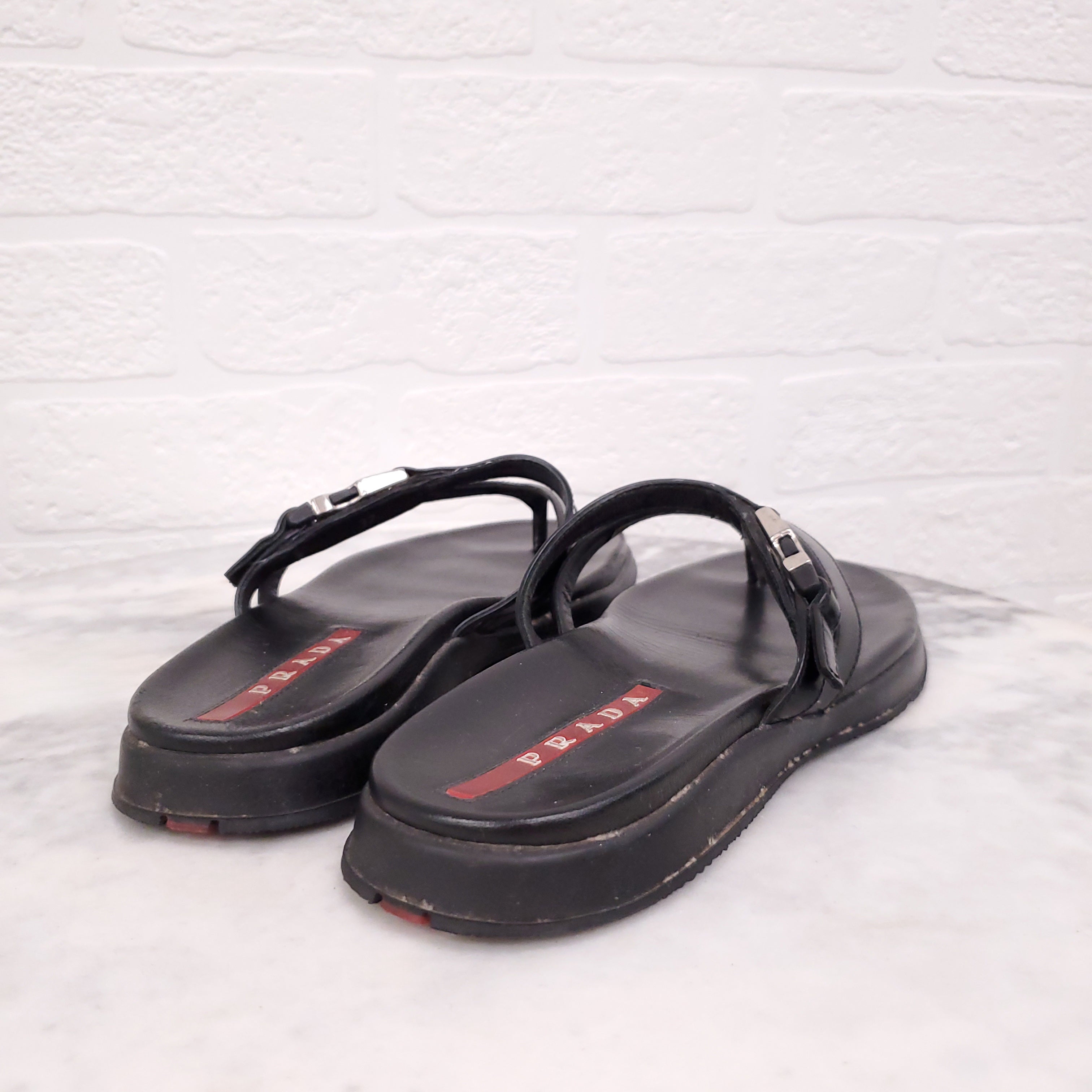 PRADA BLACK LEATHER FLIP FLOPS WITH BUCKLE - SIZE 37