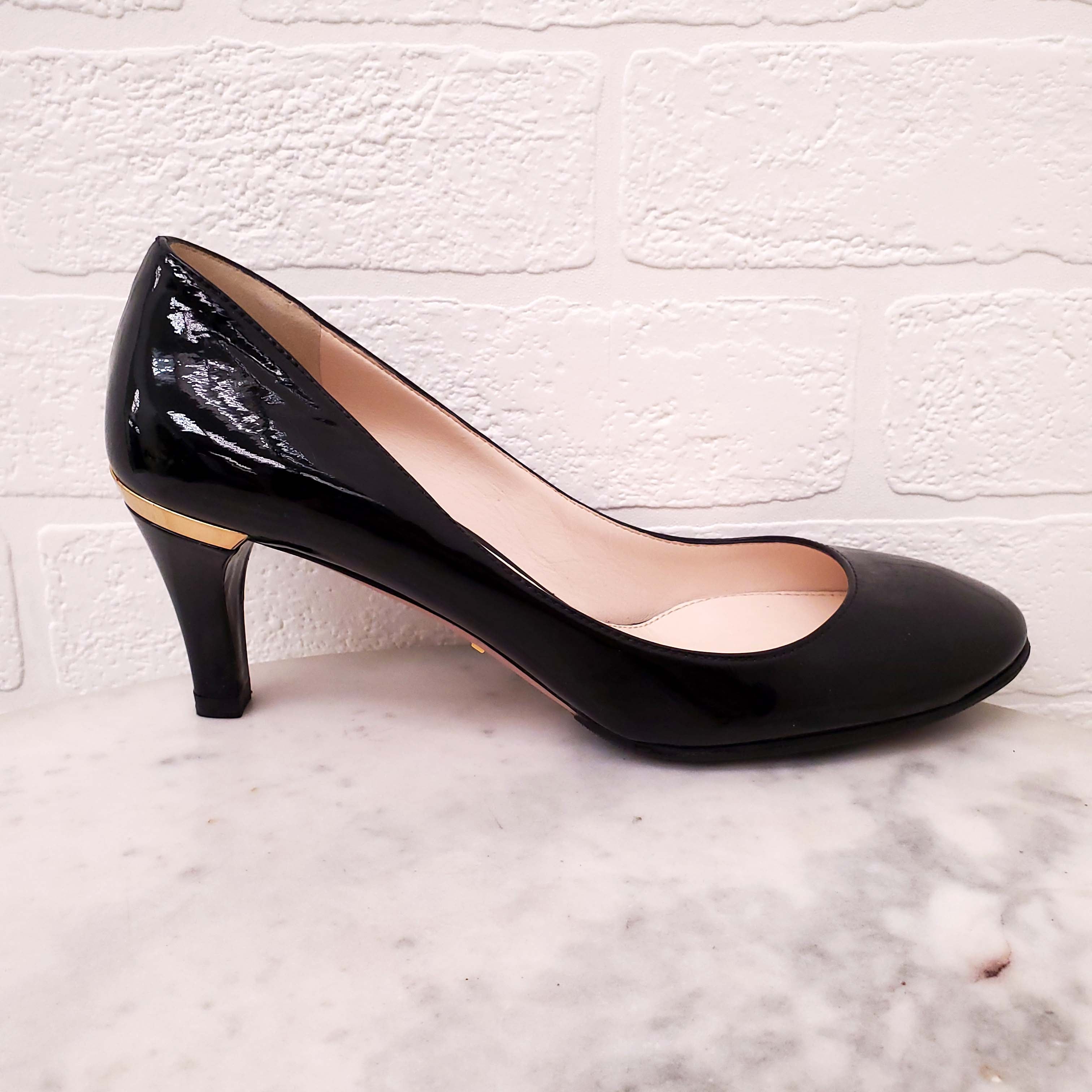 PRADA BLACK PATENT WITH GOLD LOGO HEELS - SIZE 36