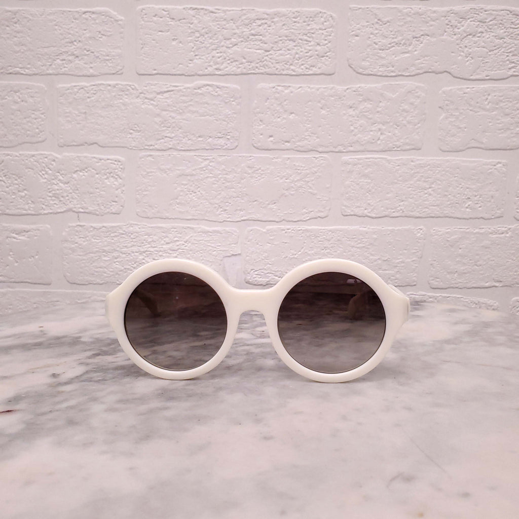 PRADA CREAM ROUND SUNGLASSES