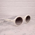 PRADA CREAM ROUND SUNGLASSES