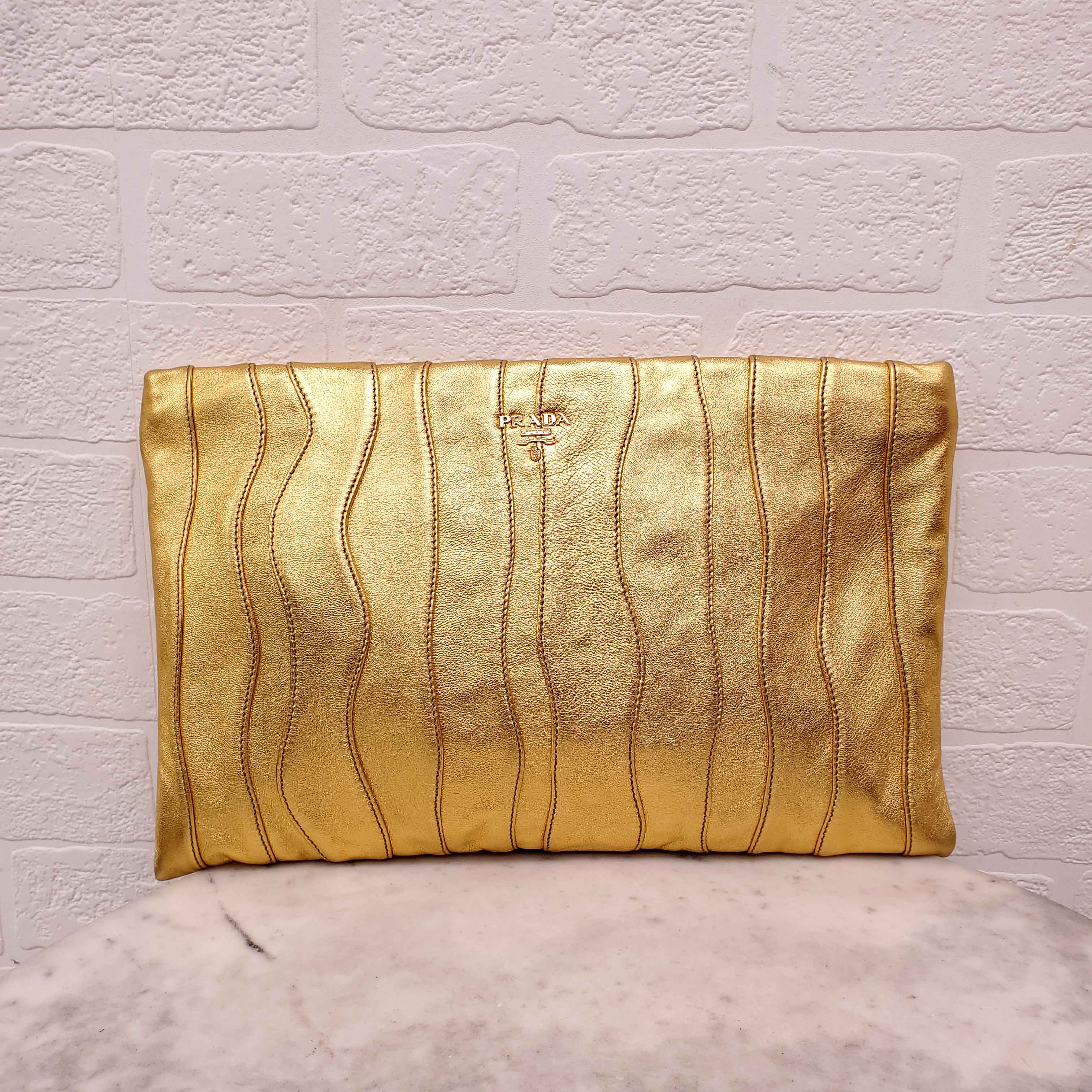 PRADA GOLD NAPA WAVE CLUTCH