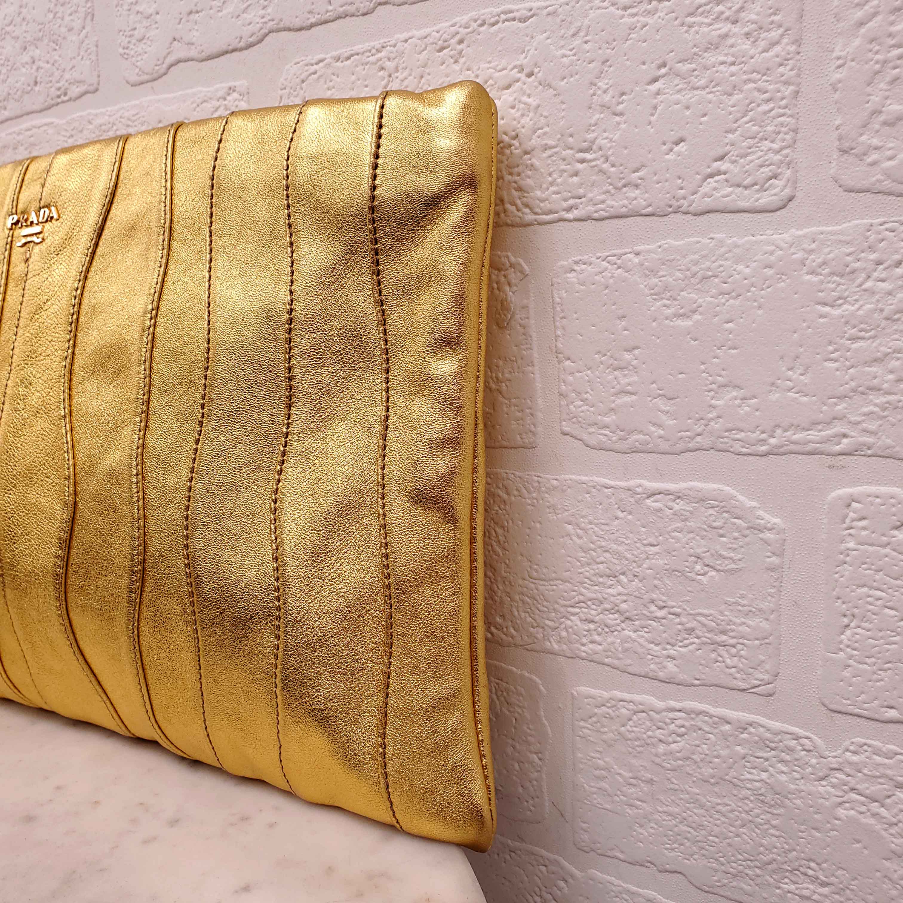 PRADA GOLD NAPA WAVE CLUTCH