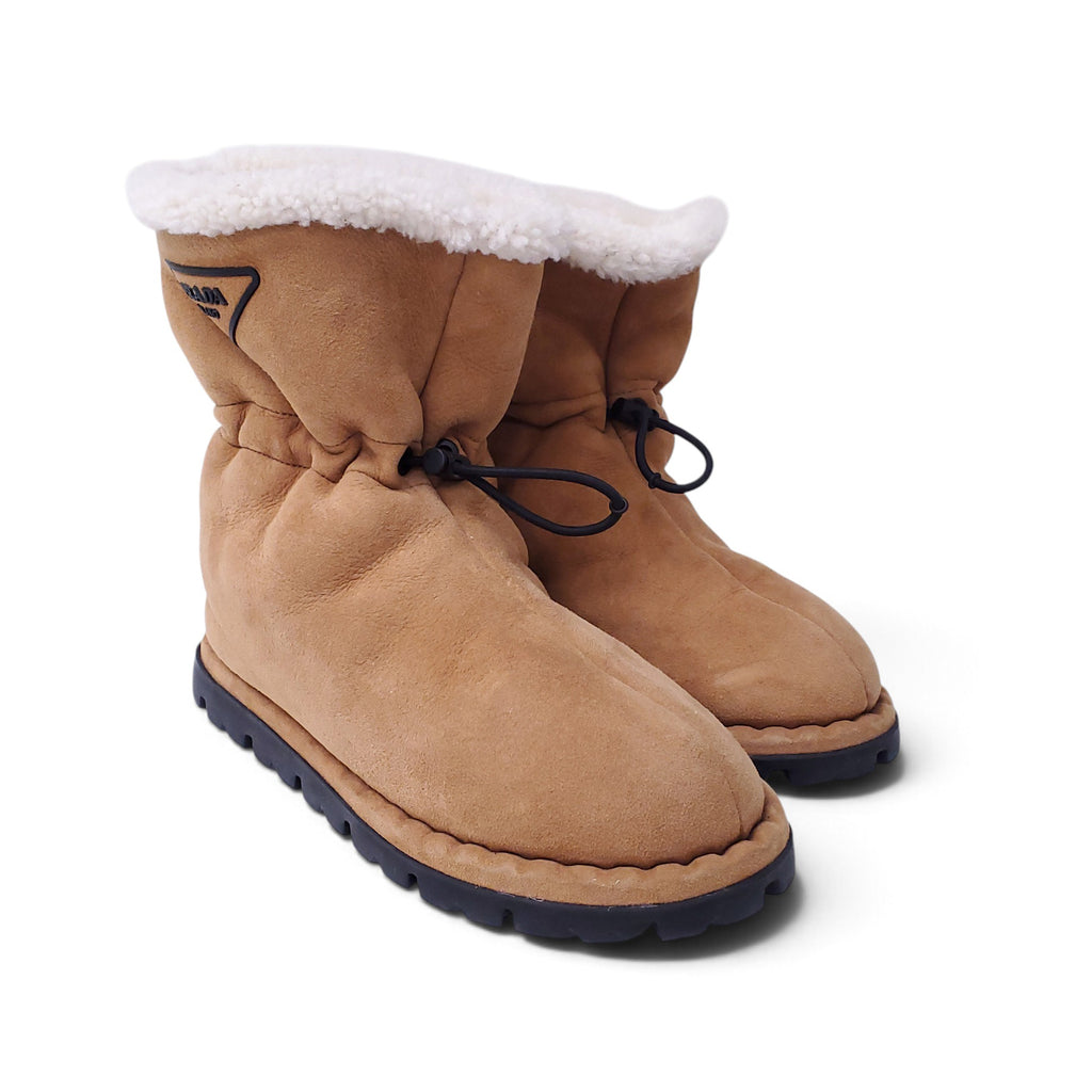 PRADA SUEDE SHEARLING LOGO BOOTS - SIZE 38.5