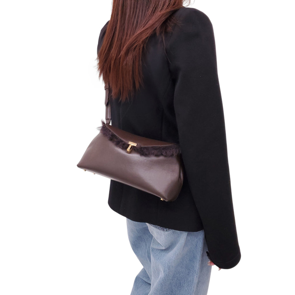 TOTEME T-LOCK SHEARLING CLUTCH
