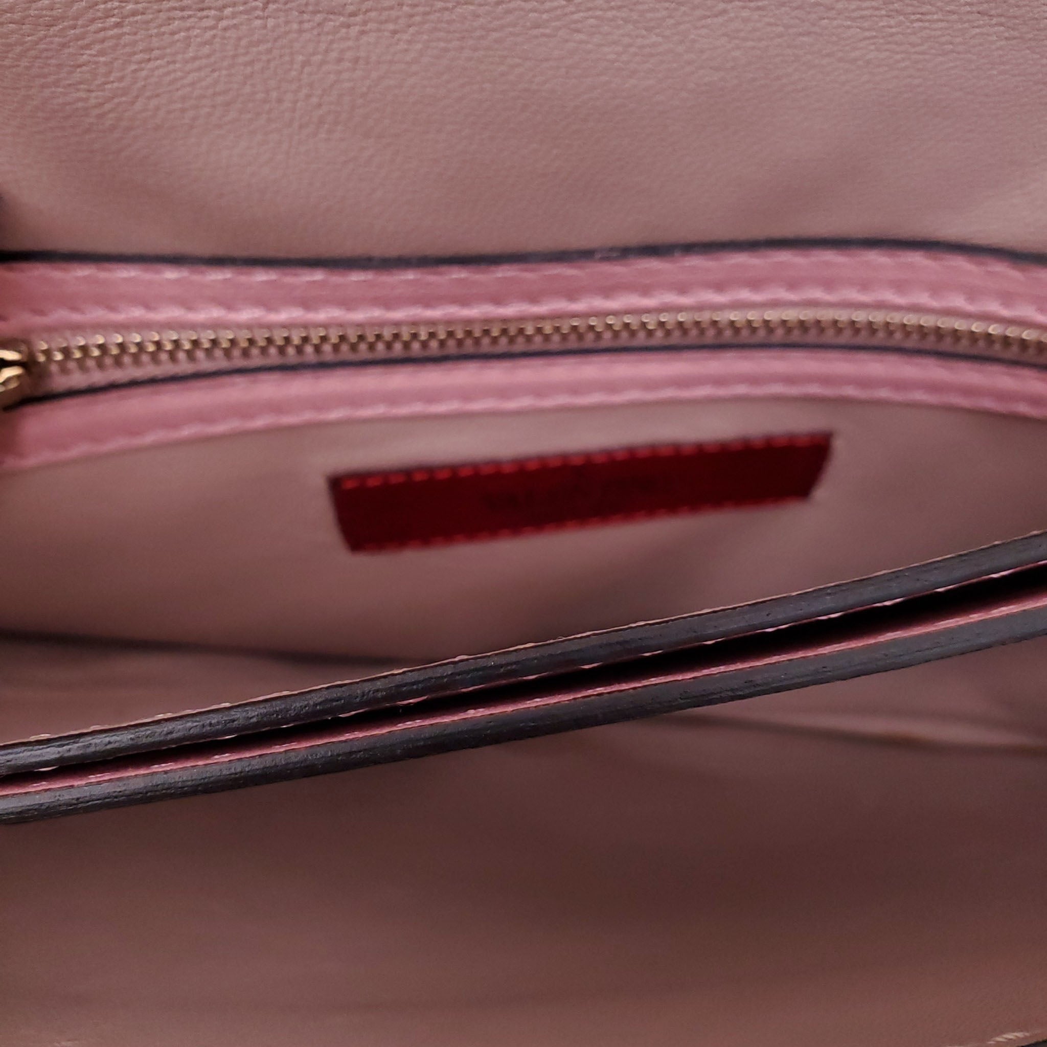 VALENTINIO PINK ROCKSTUD WRISTLET CLUTCH