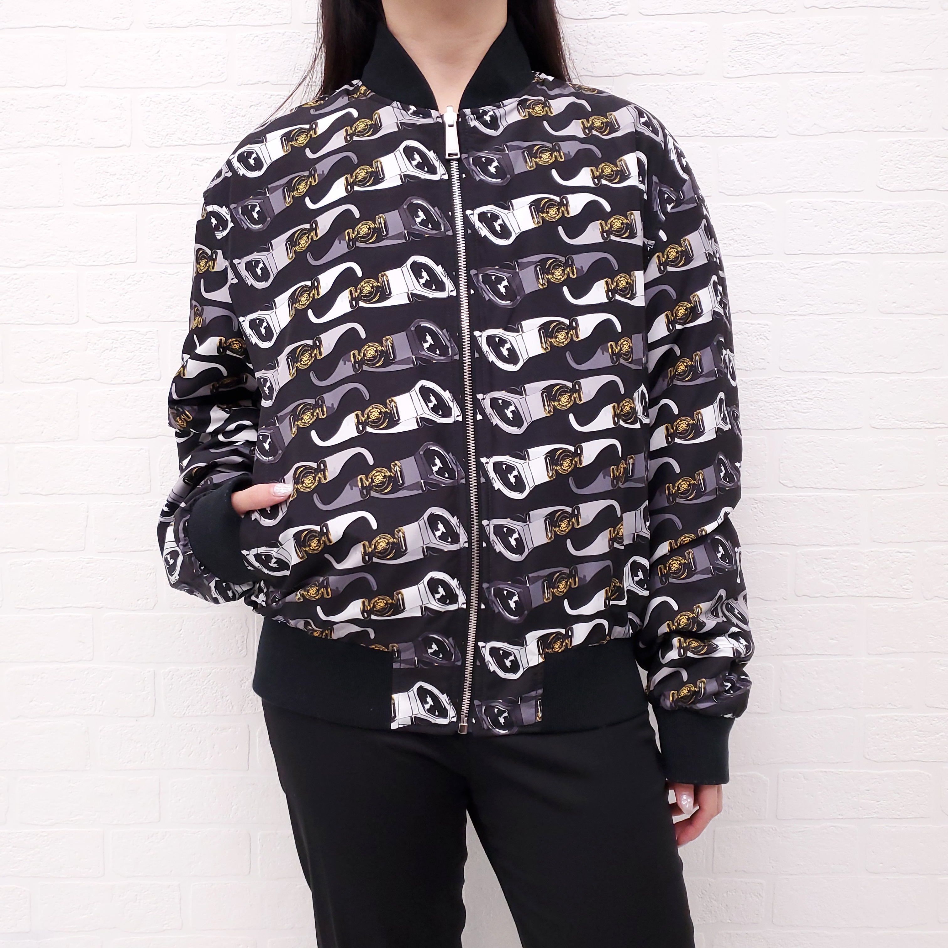 VERSACE BLACK REVERSIBLE BOMBER JACKET WITH SUNGLASSES DETAIL - SIZE 50