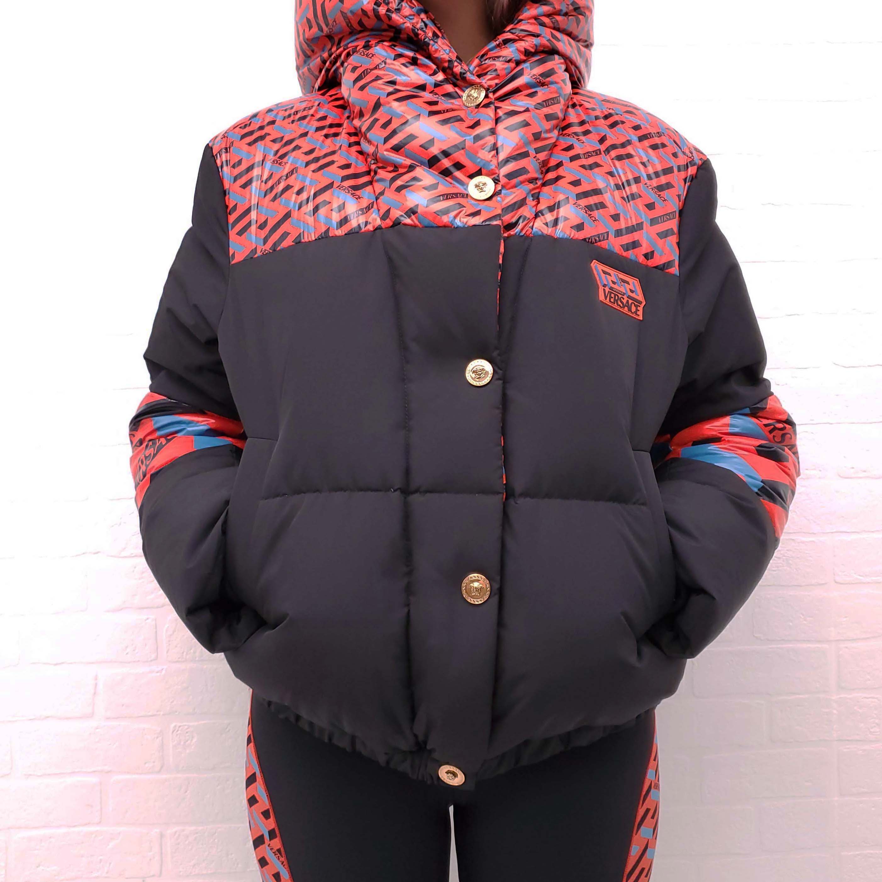 VERSACE BLACK, RED AND BLUE PATTERNED LOGO PUFFER JACKET WITH MEDUSA BUTTONS - SIZE 42