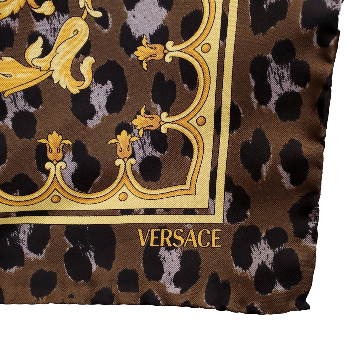 VERSACE GOLD AND BROWN SCARF WITH ANIMAL PRINT DETAIL