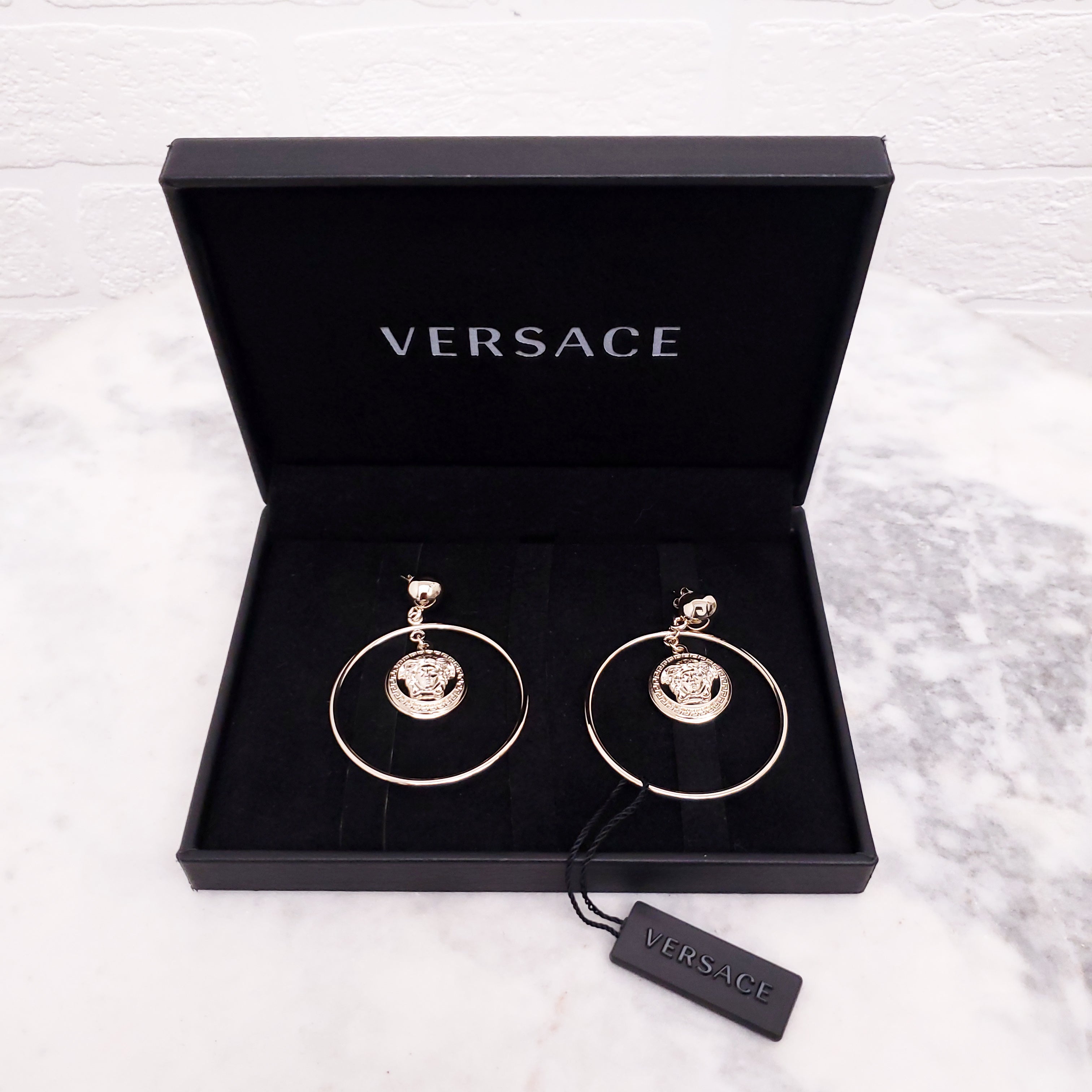 VERSACE ELECTRUM HOOP EARRINGS WITH MEDUSA EMBLEM