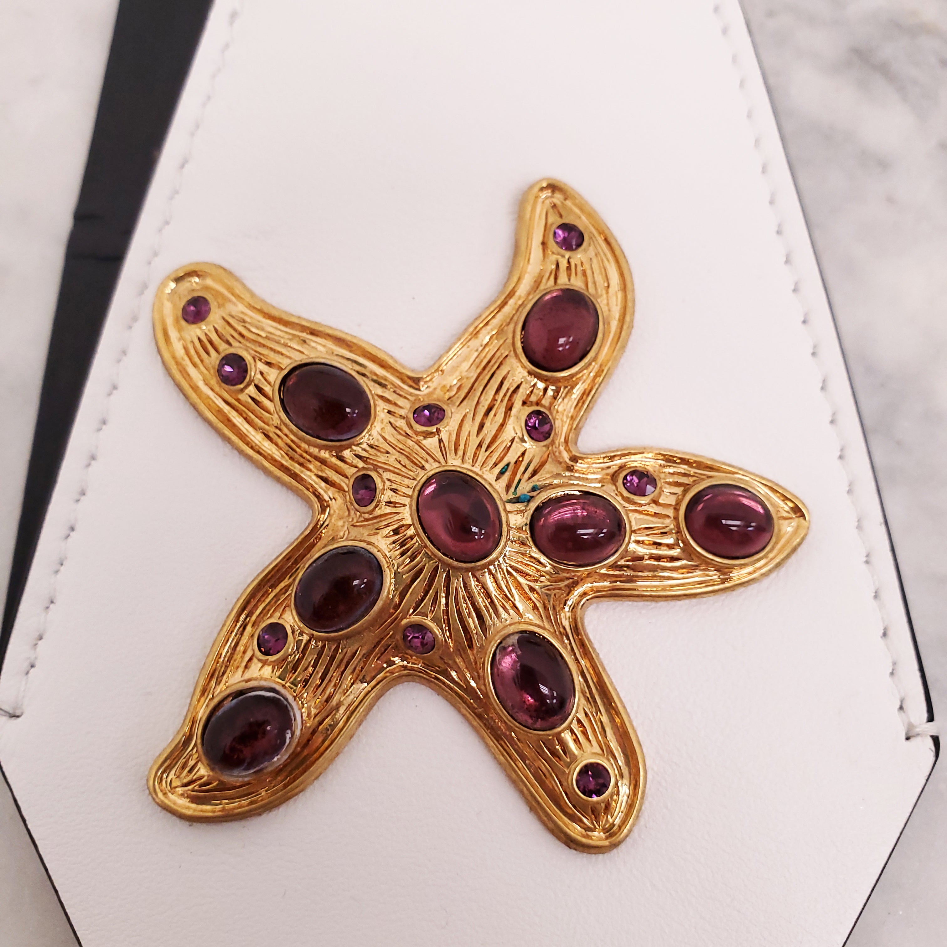 VERSACE WHITE STARFISH BAG CHARM