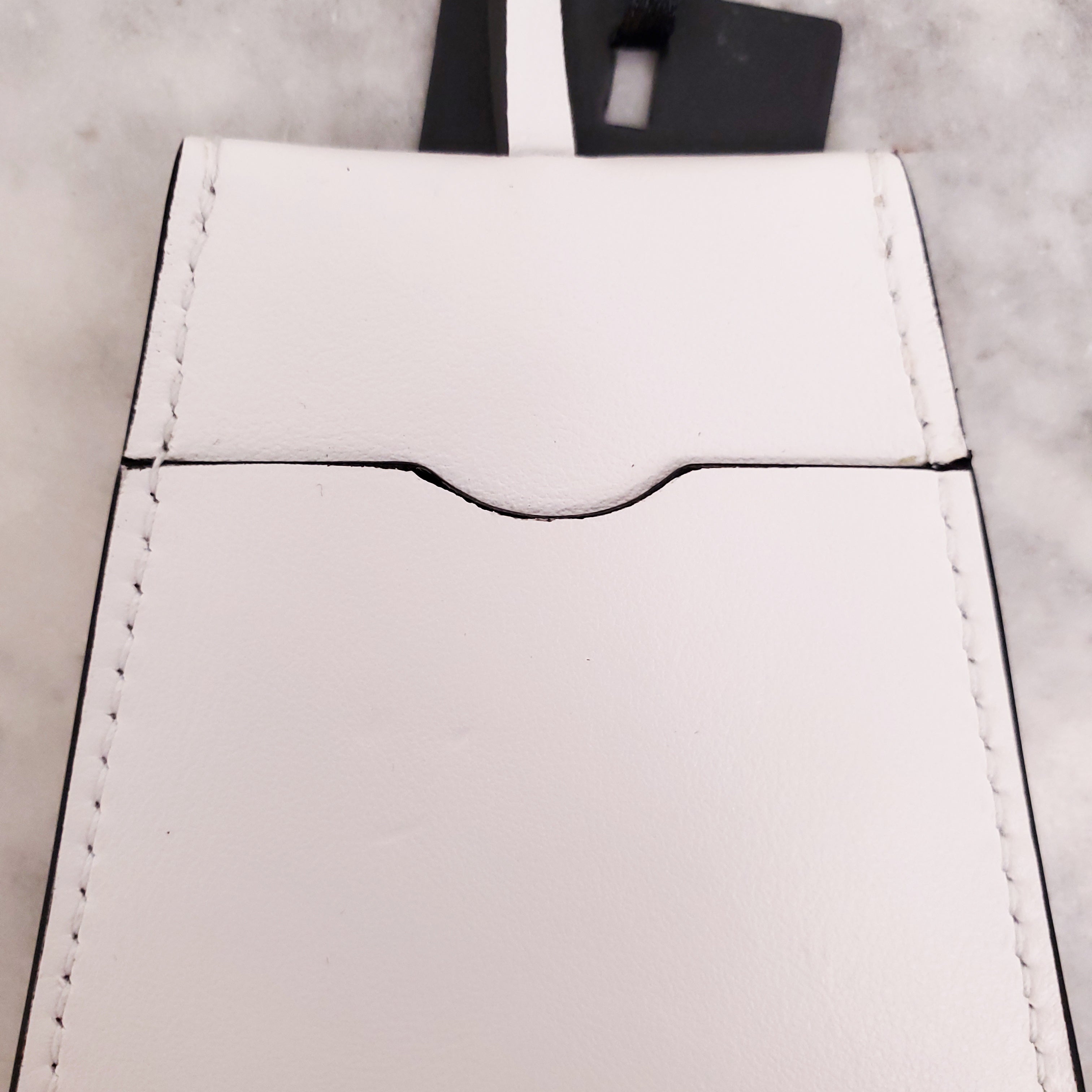 VERSACE WHITE STARFISH BAG CHARM