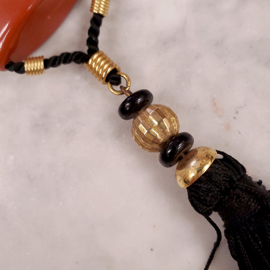 YVES SAINT LAURENT 1970 PLASTIC PENDANT NECKLACE WITH TASSEL ON ROPE