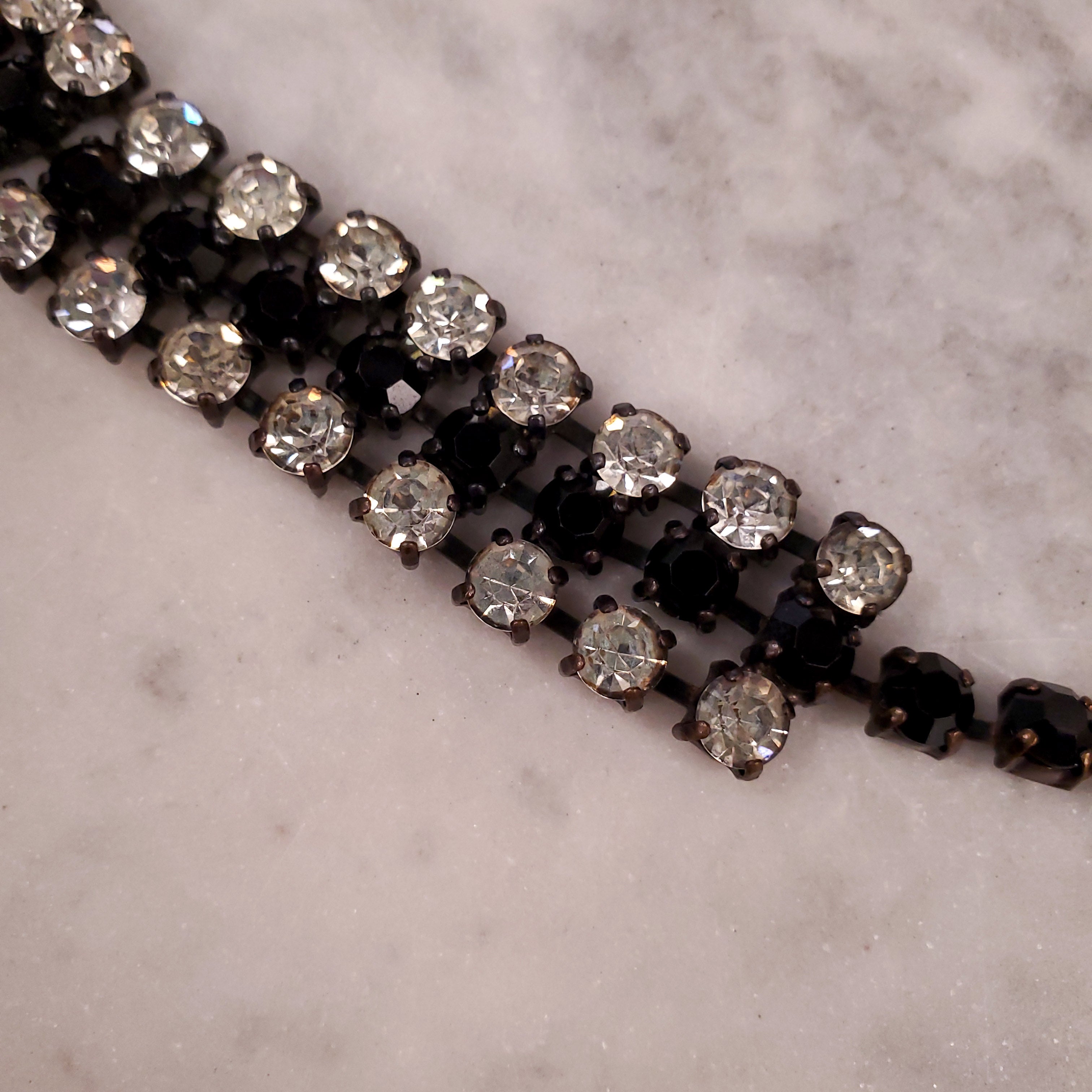 YVES SAINT LAURENT BLACK AND DIAMANTE NECKLACE WITH CRYSTAL BEAD